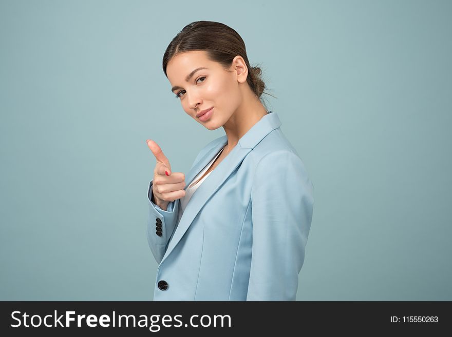 Woman Wearing Blue Shawl Lapel Suit Jacket