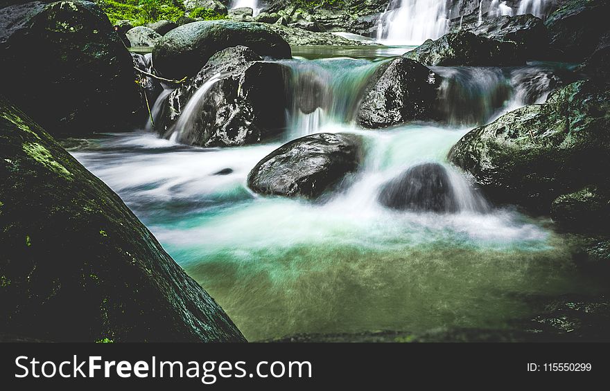 Waterfalls over Black Stones