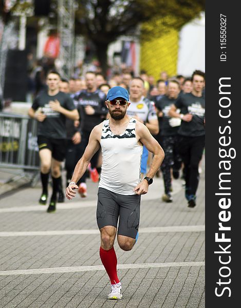 People Running Near Road