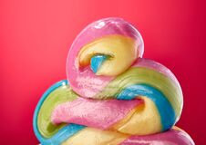 Macro Photo Of Sweet Colored Caramel Lolipop On Pink Background. Sweet And Treat - Multicolored Lolly, Macro Shoot. Stock Photo