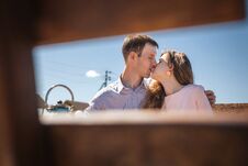 Couple Kissing On Terrace Stock Photography