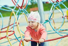 Active Little Girl On Playground Stock Photography