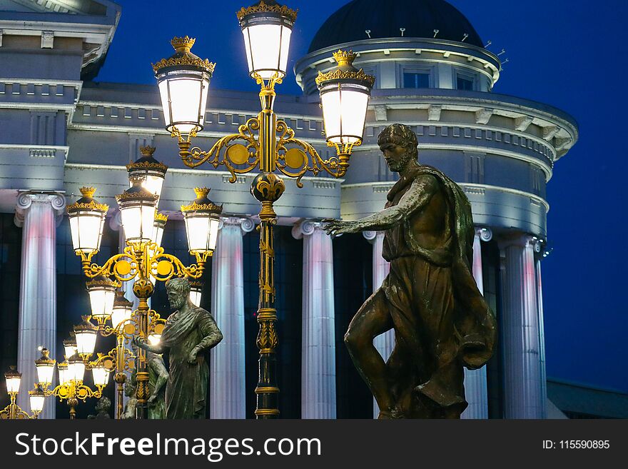 Skopje, Macedonia, Art Bridge At Night. European City Architecture, Famous Bridge With Sculptures.