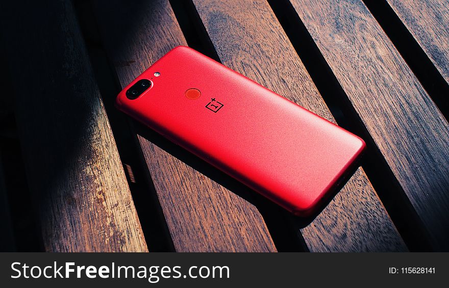 Close-Up Photography of Red Mobile Phone