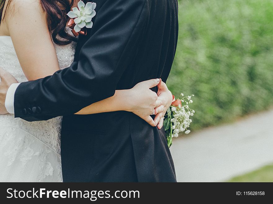 Photo of Bride and GroomHugging