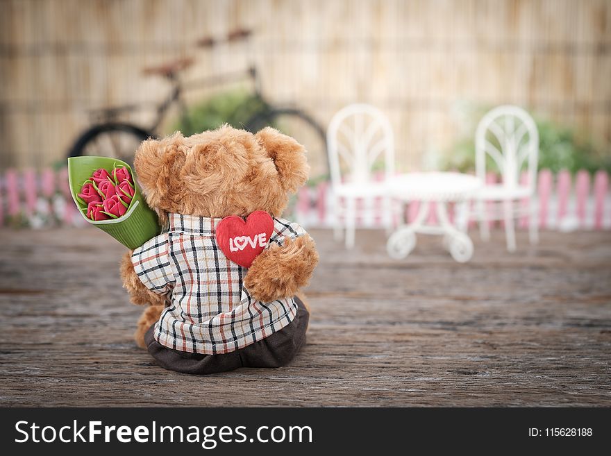 Brown Bear Plush Toy Holding Red Rose Flower