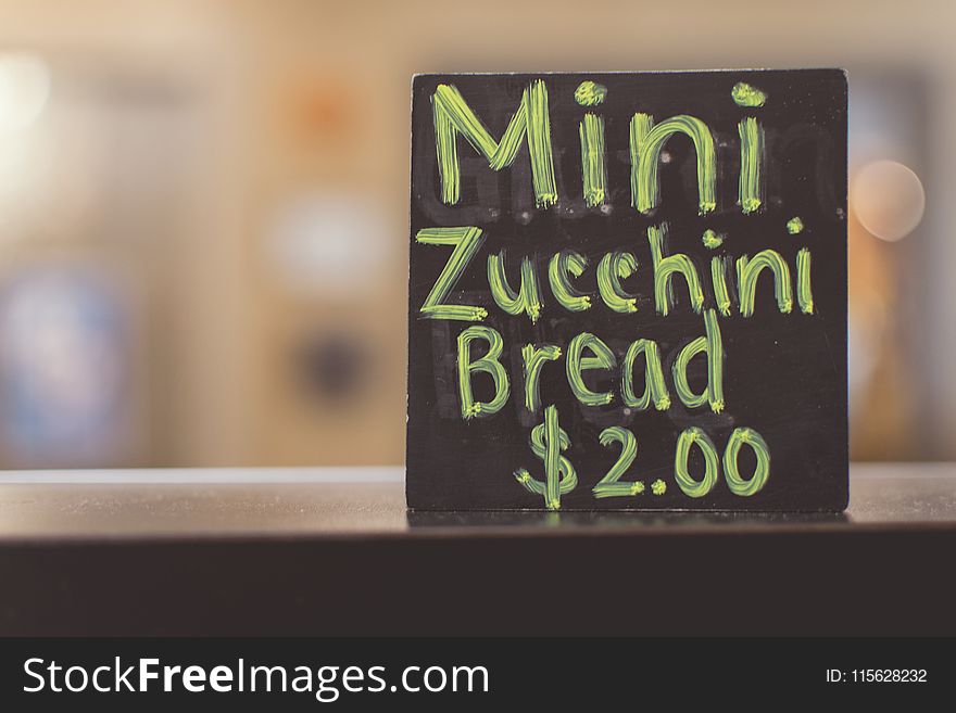 Close-up Photography Of Mini Zucchini Bread Sign