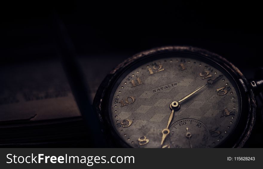 Close-up Photography of Vintage Watch