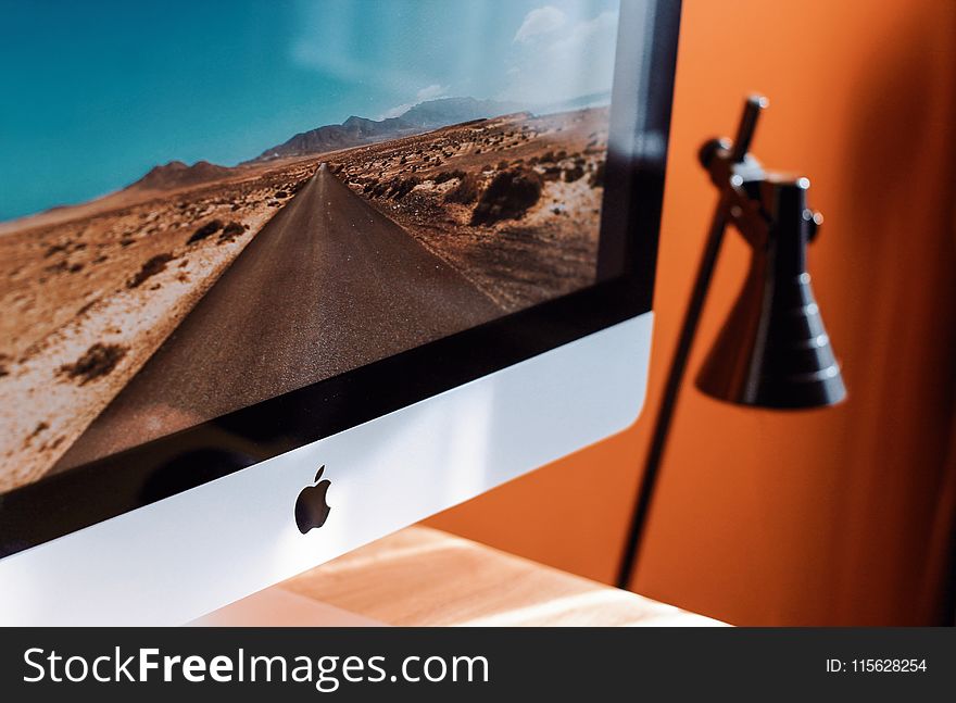 Close-Up Photography of iMac Turned On