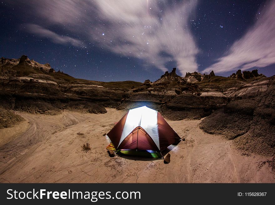 Brown and White Dome Tent at Nighttime