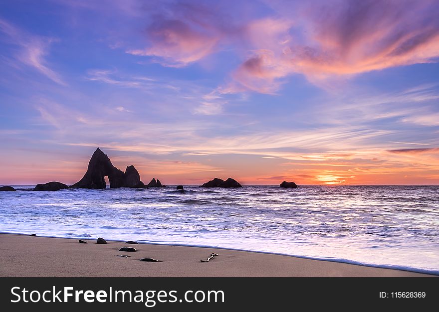 Sea and Rock Formation Photo