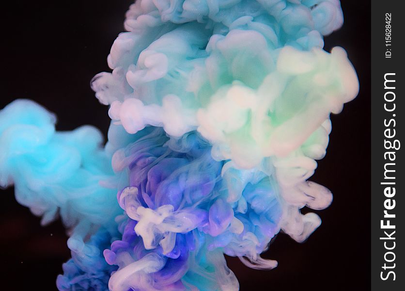 Photo of White, Purple, and Blue Smoke
