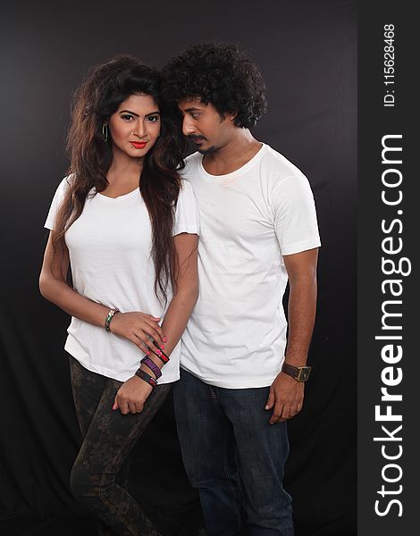 Man and Woman Wearing White Crew-neck T-shirts