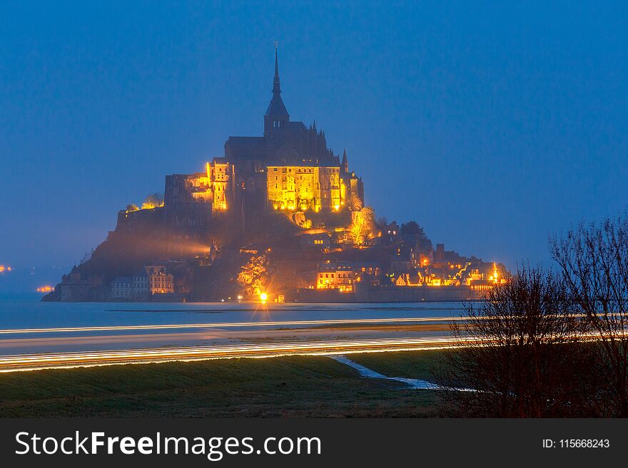 View of the Abbey Mont-Saint-Michel at sunset. France. Normandy. View of the Abbey Mont-Saint-Michel at sunset. France. Normandy.