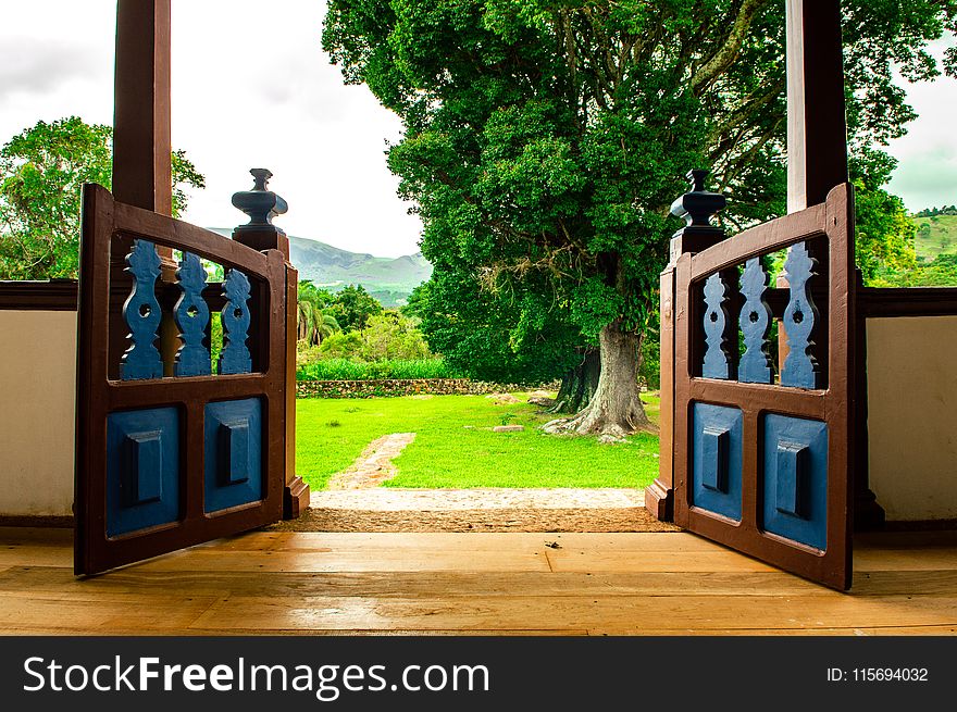 Opened Brown Wooden Gate