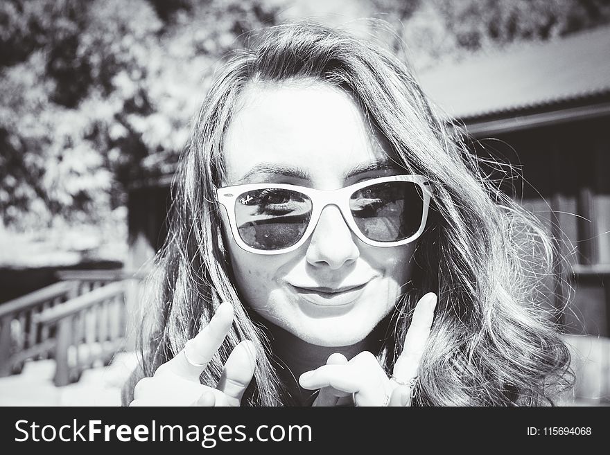 Grayscale Photography Of Woman Wearing Sunglasses