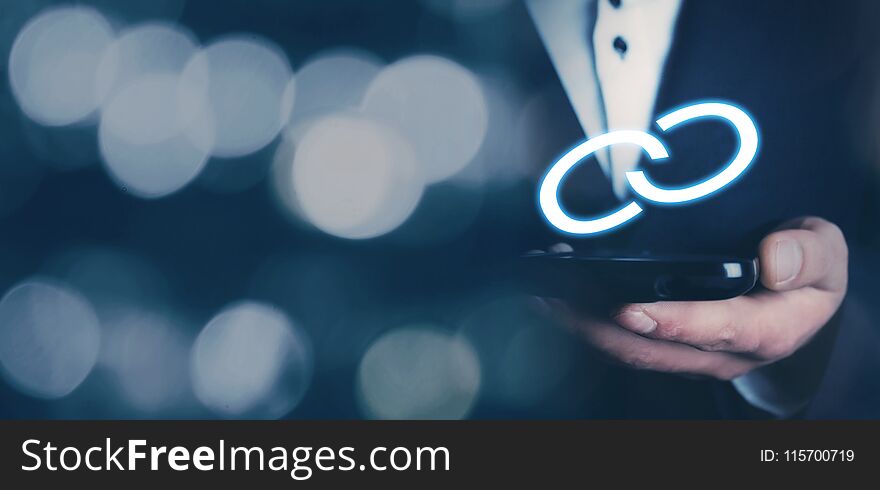 Businessman holding link icon. Business concept