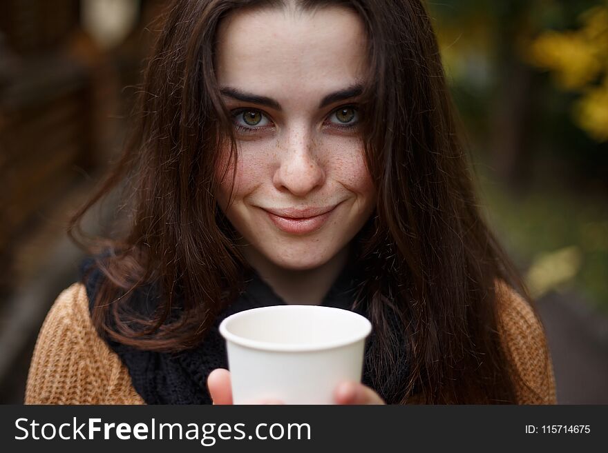 Close Up Portrait Of Young Pretty Smiling Woman Wearing Knitted