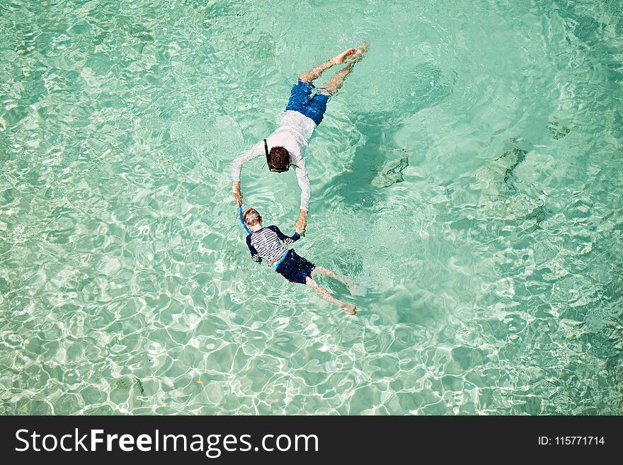 Family Snorkeling Together