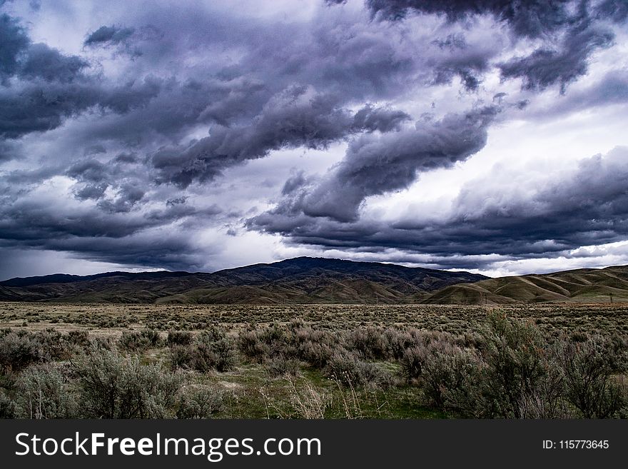 Mountains Under Cloudy Sky