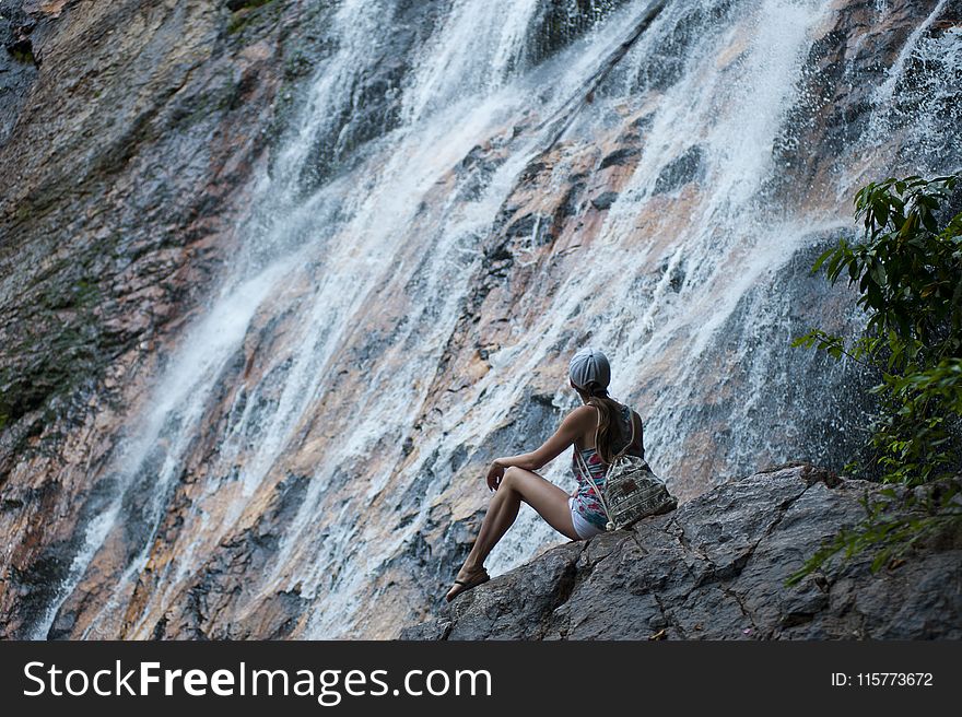 Woman Near Waterfalls