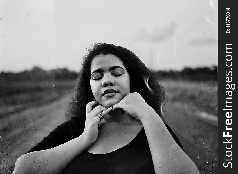 Grayscale Shallow Focus Photography Of Woman In Scoop-neck Top