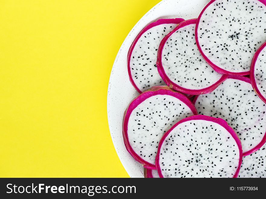 Sliced Dragon Fruit On White Plate