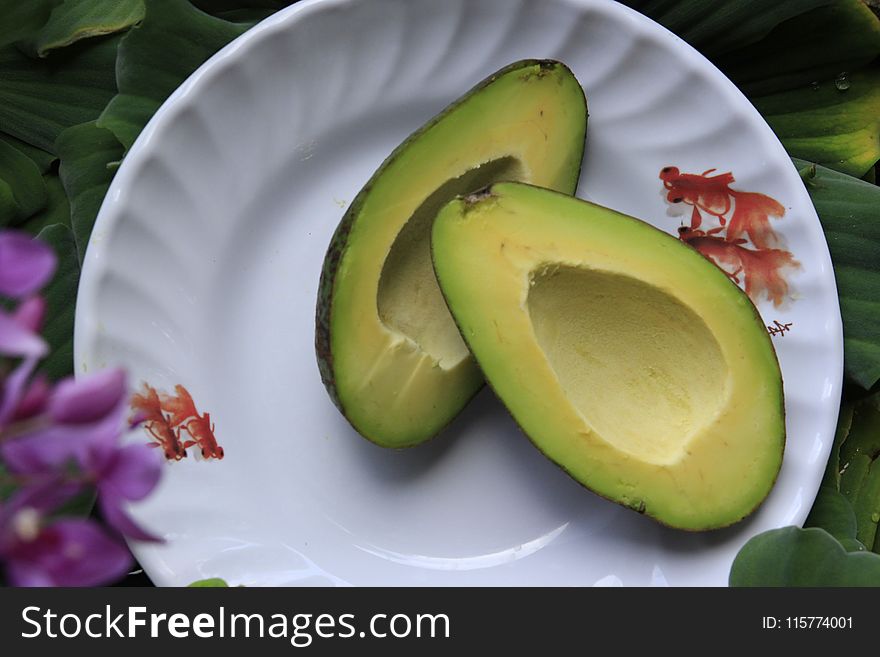 Sliced Avocado Fruits on Round White Ceramic Plate