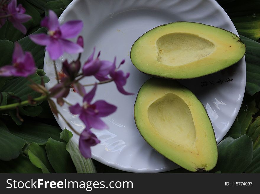 Sliced Avocado on White Ceramic Plate