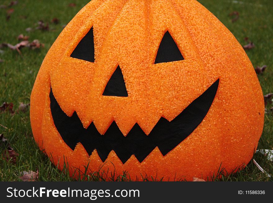 Jack o Lantern Pumpkin on grass. Jack o Lantern Pumpkin on grass