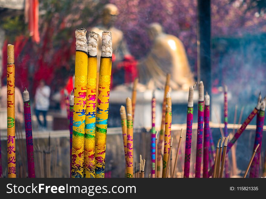 Chinese People Burn Incense and Pray in an Ancient Chinese Temple