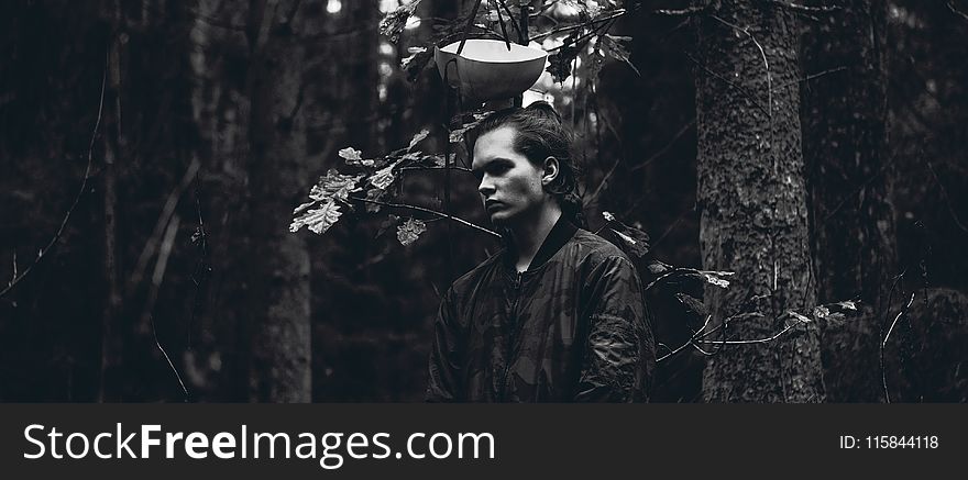 Greyscale Photo Of Man In Jacket