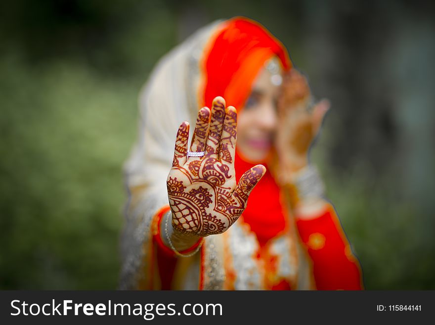 Woman With Brown Henna Tattoo