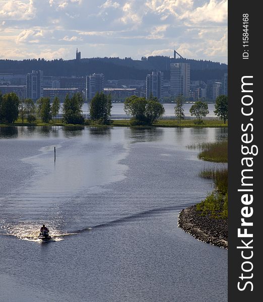 Person Riding Personal Watercraft