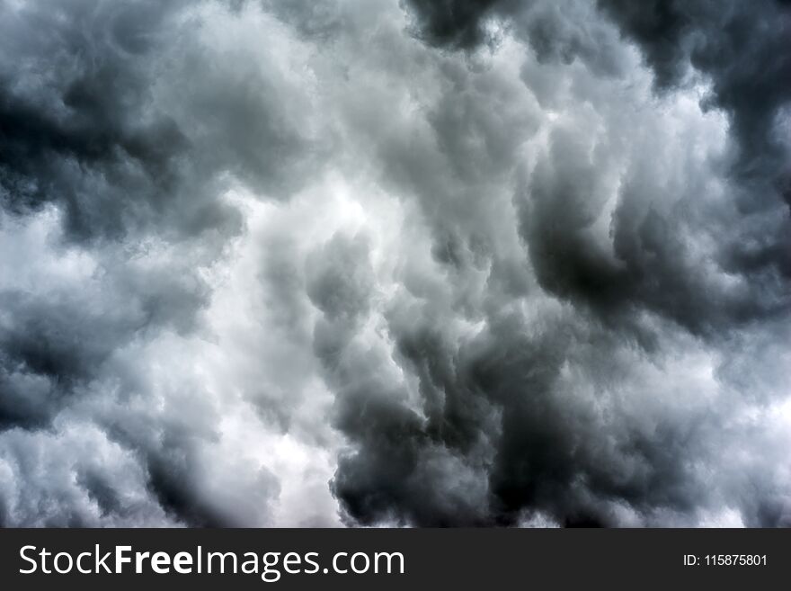 Beautiful dark ominous grey storm clouds. Dramatic sky, like apocalypse. Beautiful dark ominous grey storm clouds. Dramatic sky, like apocalypse