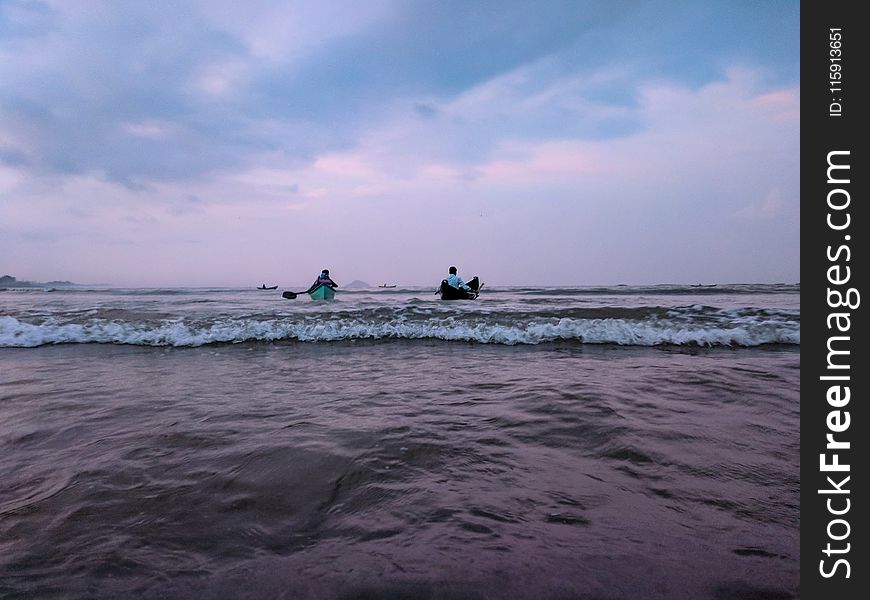 Two Man On Boats