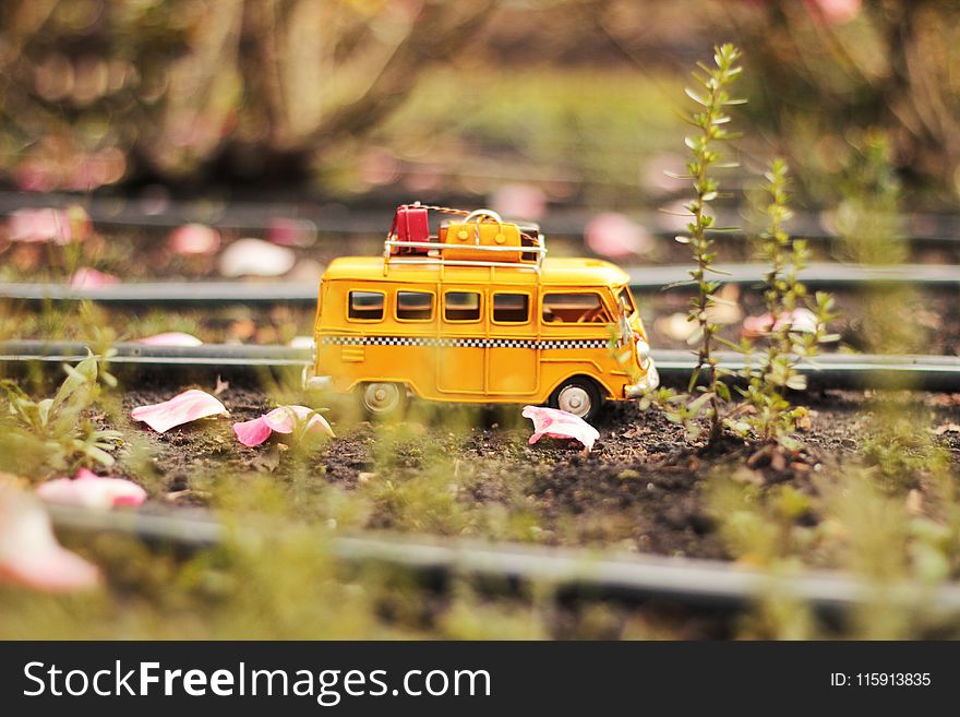 Tilt Shift And Selective Color Photo Of White Van Miniature