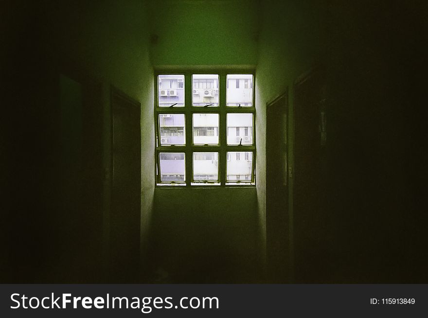 Sun Shine on 6-pane Window in Dark Room