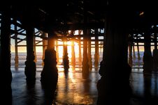 Sun Blasting Through The Pylons Of The Pacific Beach Pier In San Diego. Stock Photos