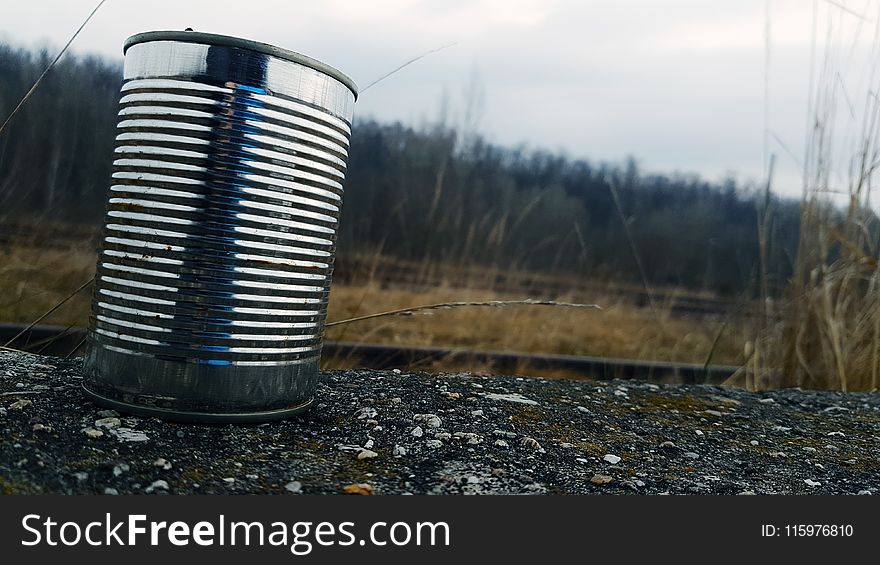 Tin Can on Gravel Surface