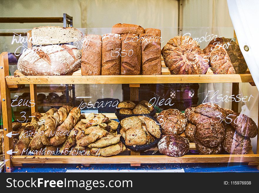 Brown Wooden Rack With Baked Bread Displayed