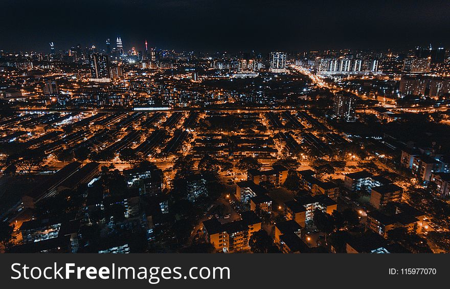 Aerial Photo of City Buildings during Night Time