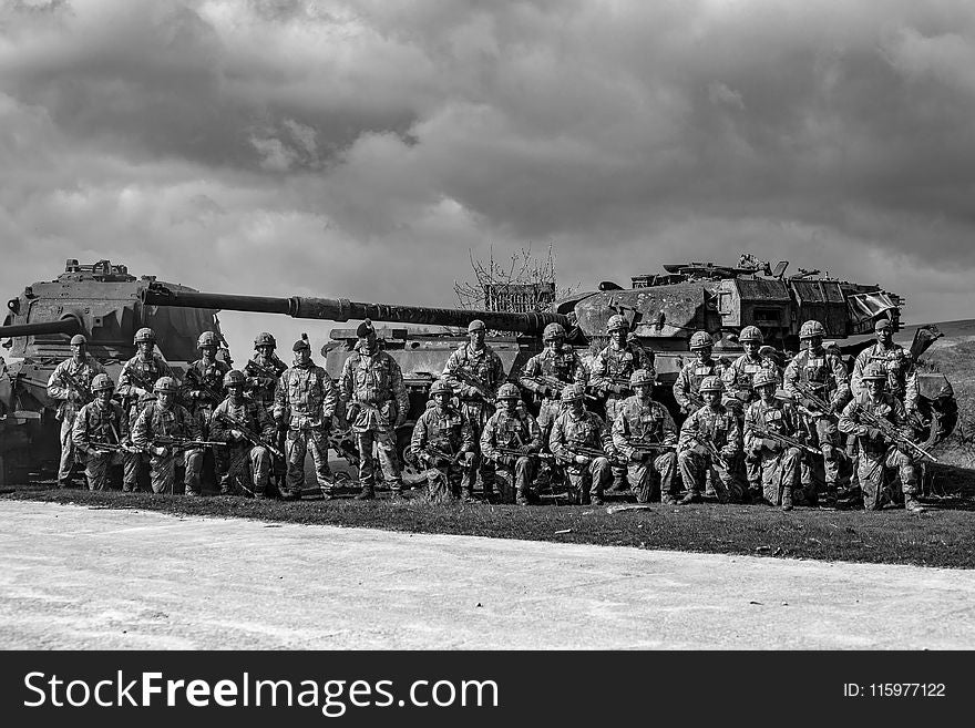 Greyscale Photography of Group of Soldiers