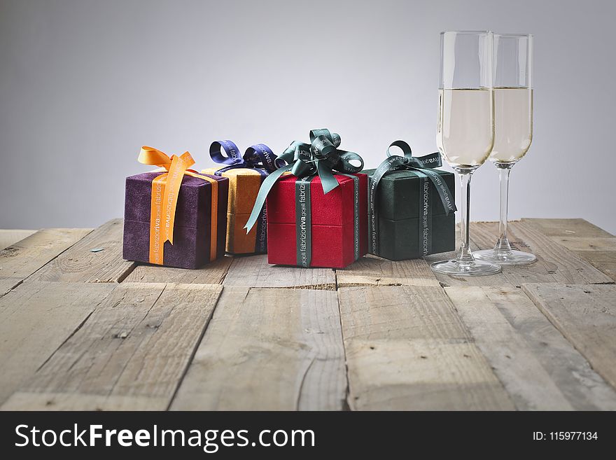 Five Assorted Gift Boxes and Two Flute Glasses