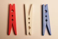 Three Clothes Pegs Royalty Free Stock Images