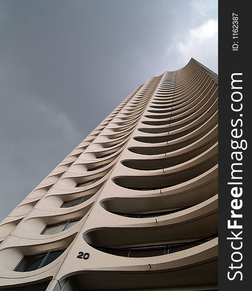 A white residential tower building