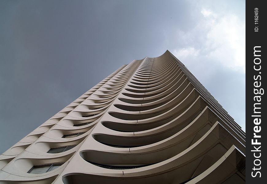 A white residential tower building
