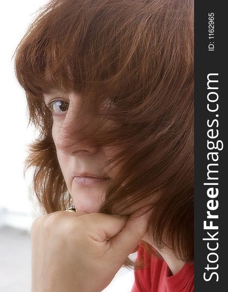 Unusual portrait of female hair partially covering face. Unusual portrait of female hair partially covering face