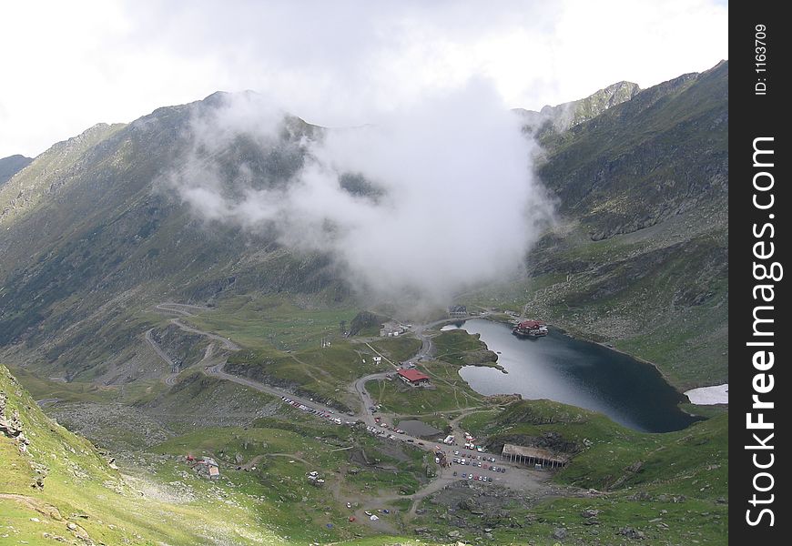 This is a bird-view of lake Balea and Balea-lake chalets at 2034m, in Romania. This is a bird-view of lake Balea and Balea-lake chalets at 2034m, in Romania.