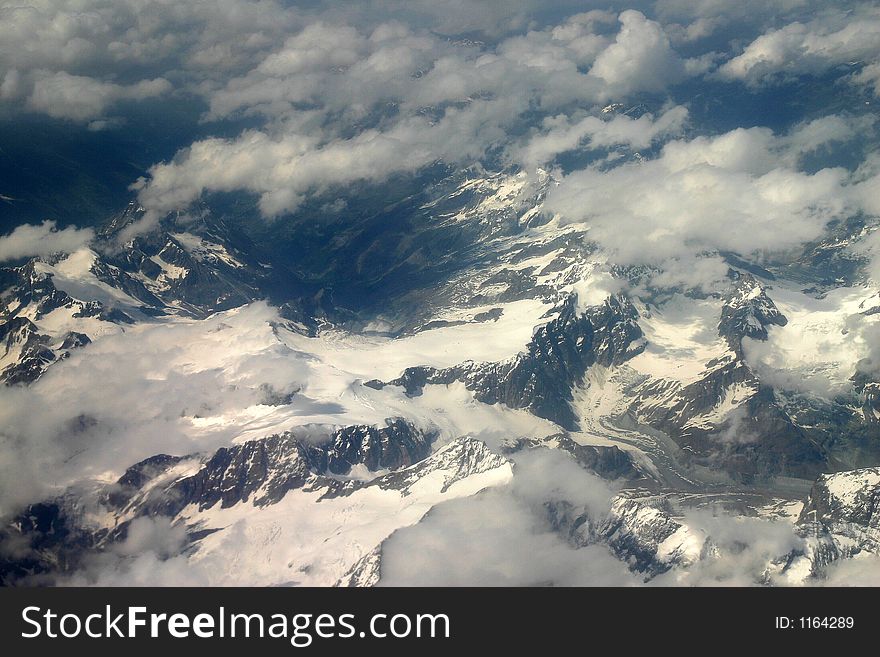 Seen from 30000 feet, the beautiful Alps. Seen from 30000 feet, the beautiful Alps.